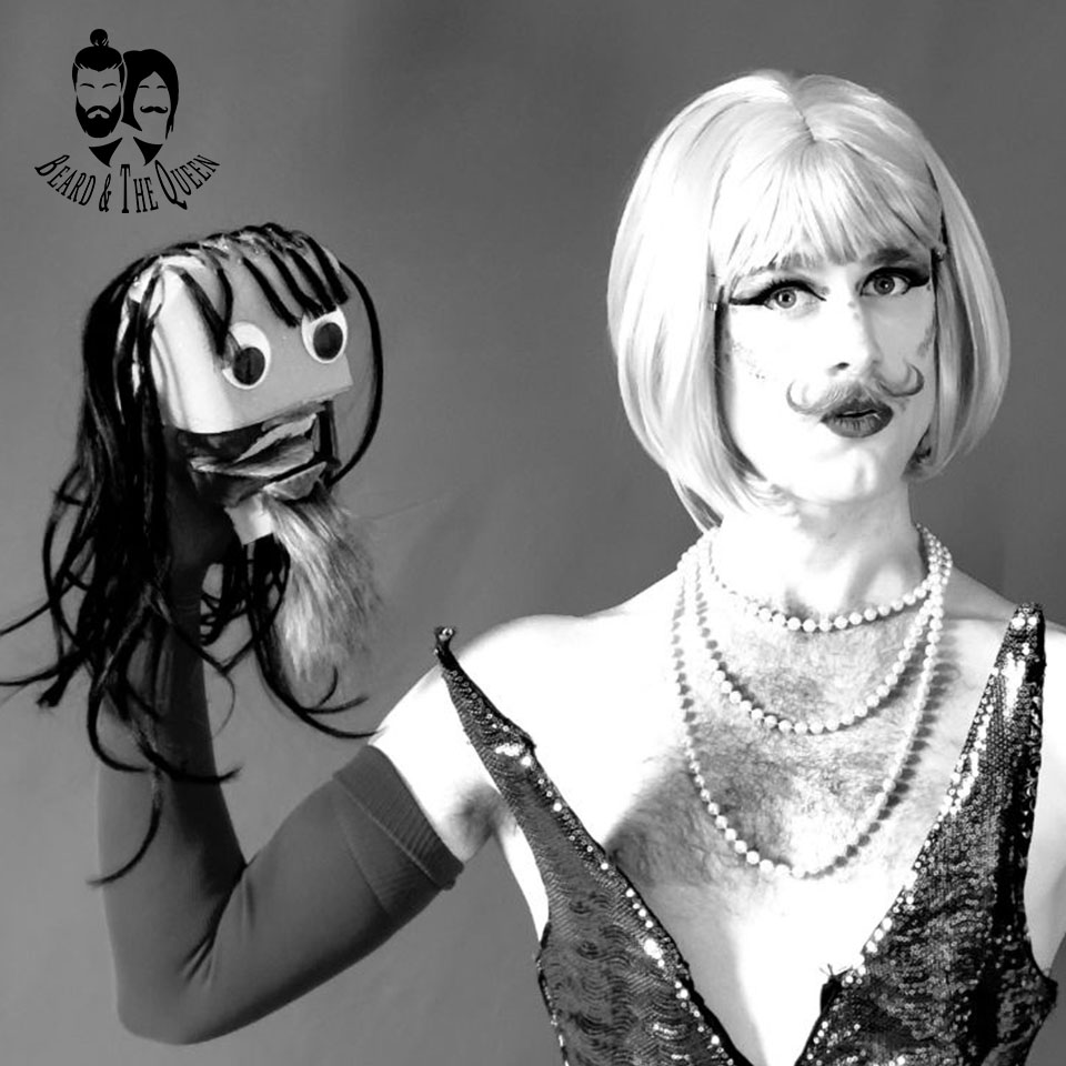 Dark Sugar drag queen with Sock Jesus